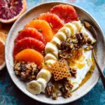 Winter Citrus Ricotta Breakfast Bowl with Honeycomb.